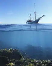 Neznámý: Plachetnice nad korálovým útesem